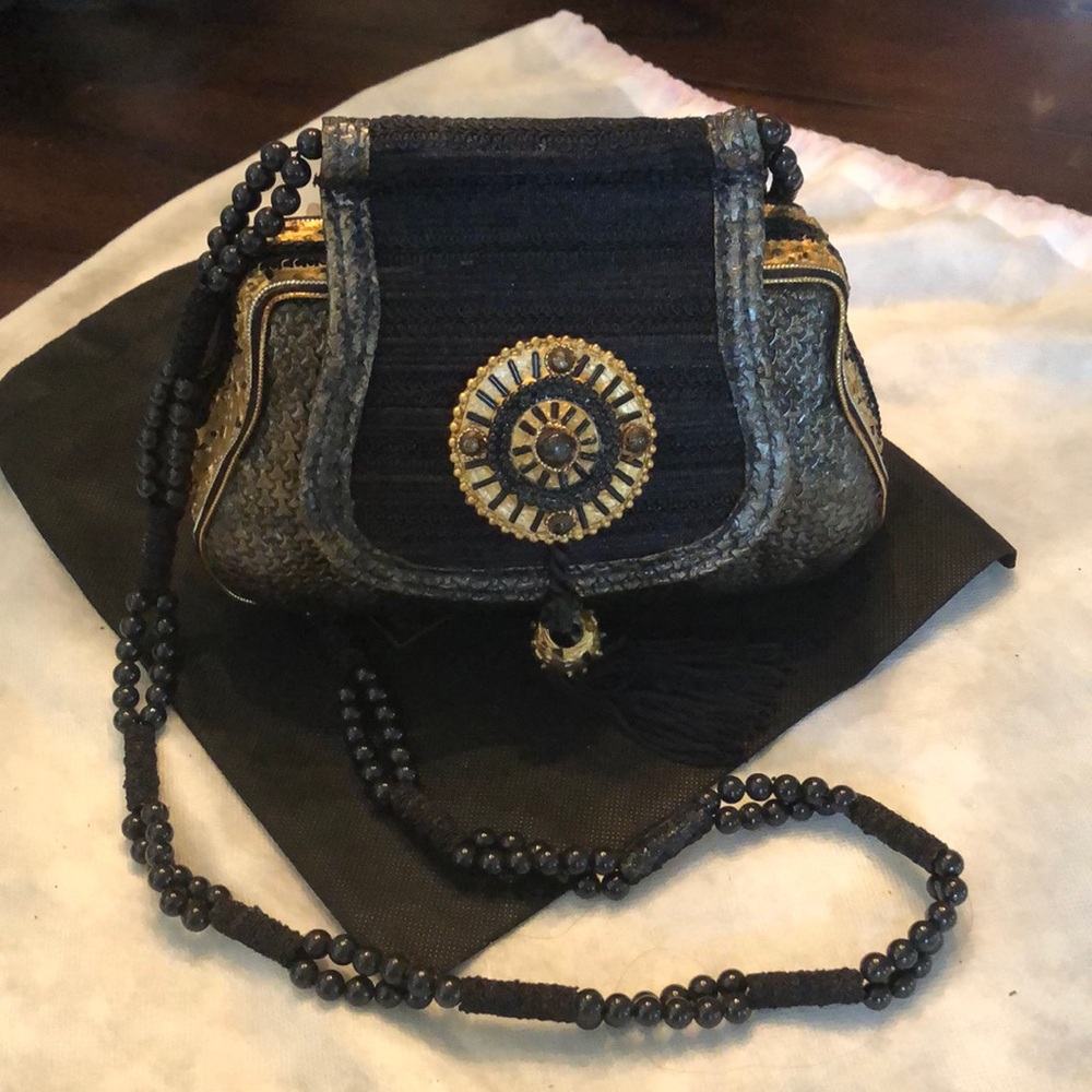 Mary Frances Motif medallion tassel bead close carved handmade bead strap bag
